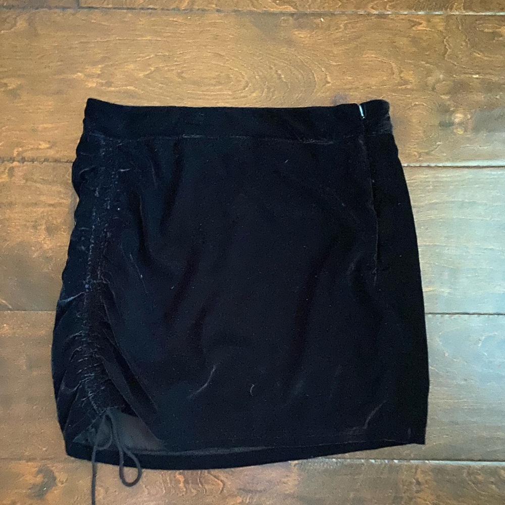 Black velvet skirt; size 6.
